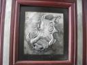 worthog done in Pewter with wood and Pewter frame