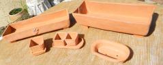 Selection of herb planters in terracotta